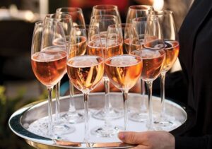 serving wine at wedding